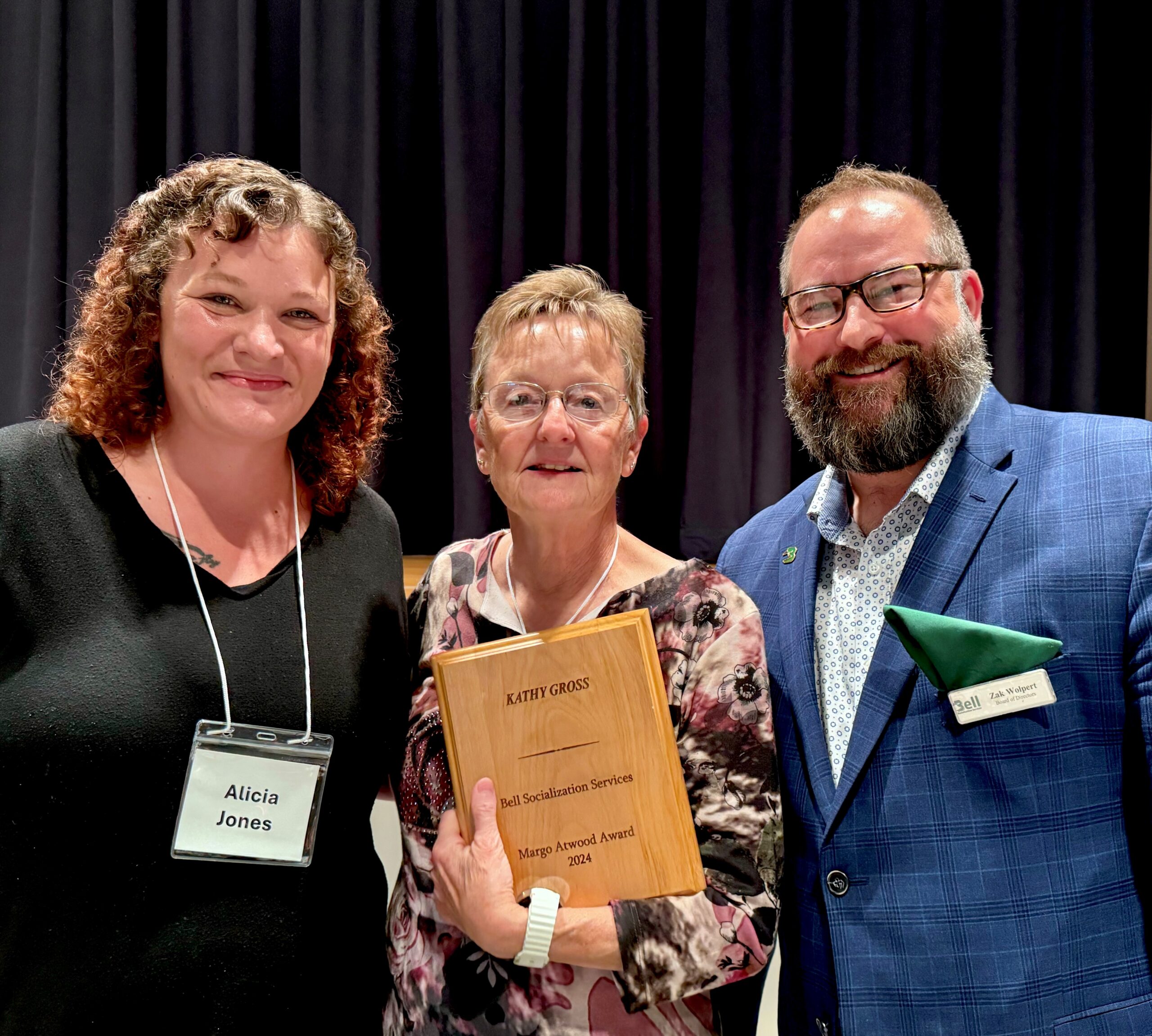 Alicia, the Day Program Supervisor, alongside Kathy Gross and Zak Wolpert, President of Bell's Board of Directors.